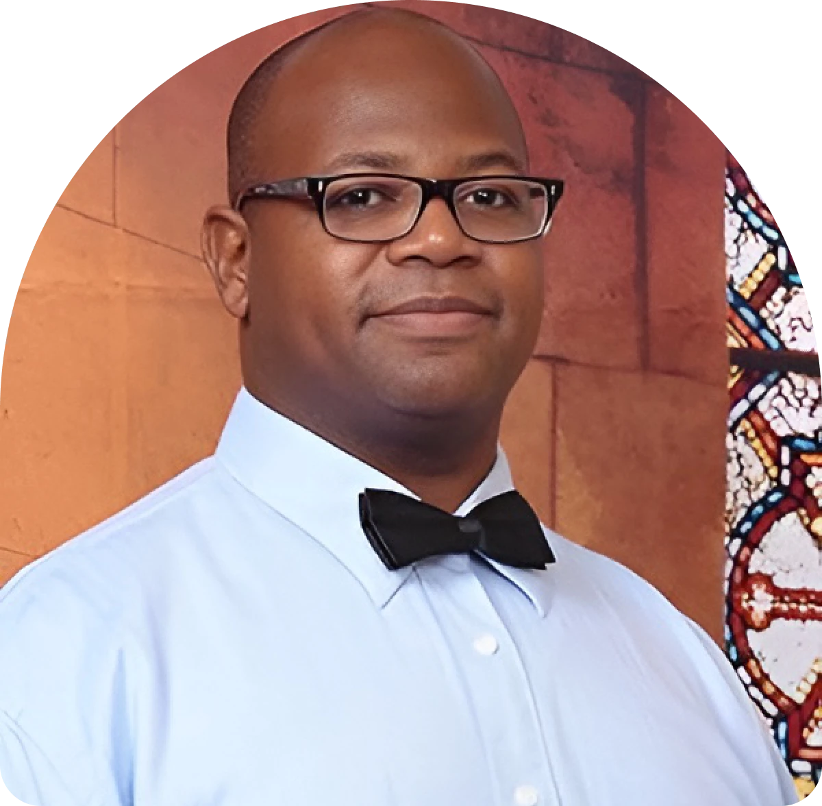 Man in bow tie and glasses